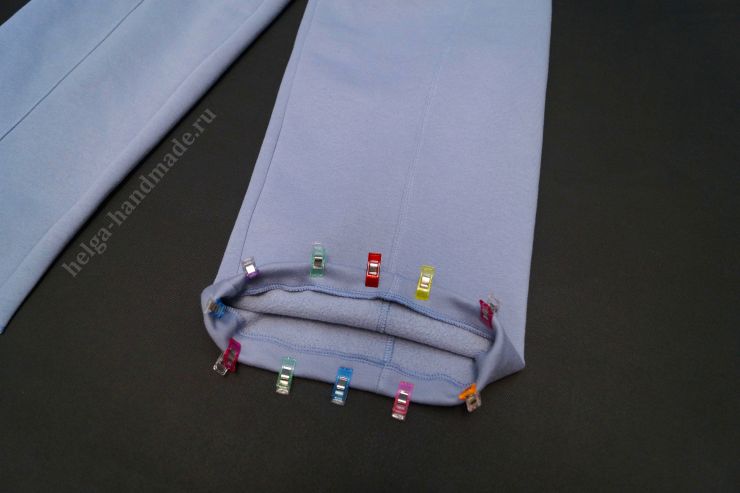 Обратотка нижнего среза брюк